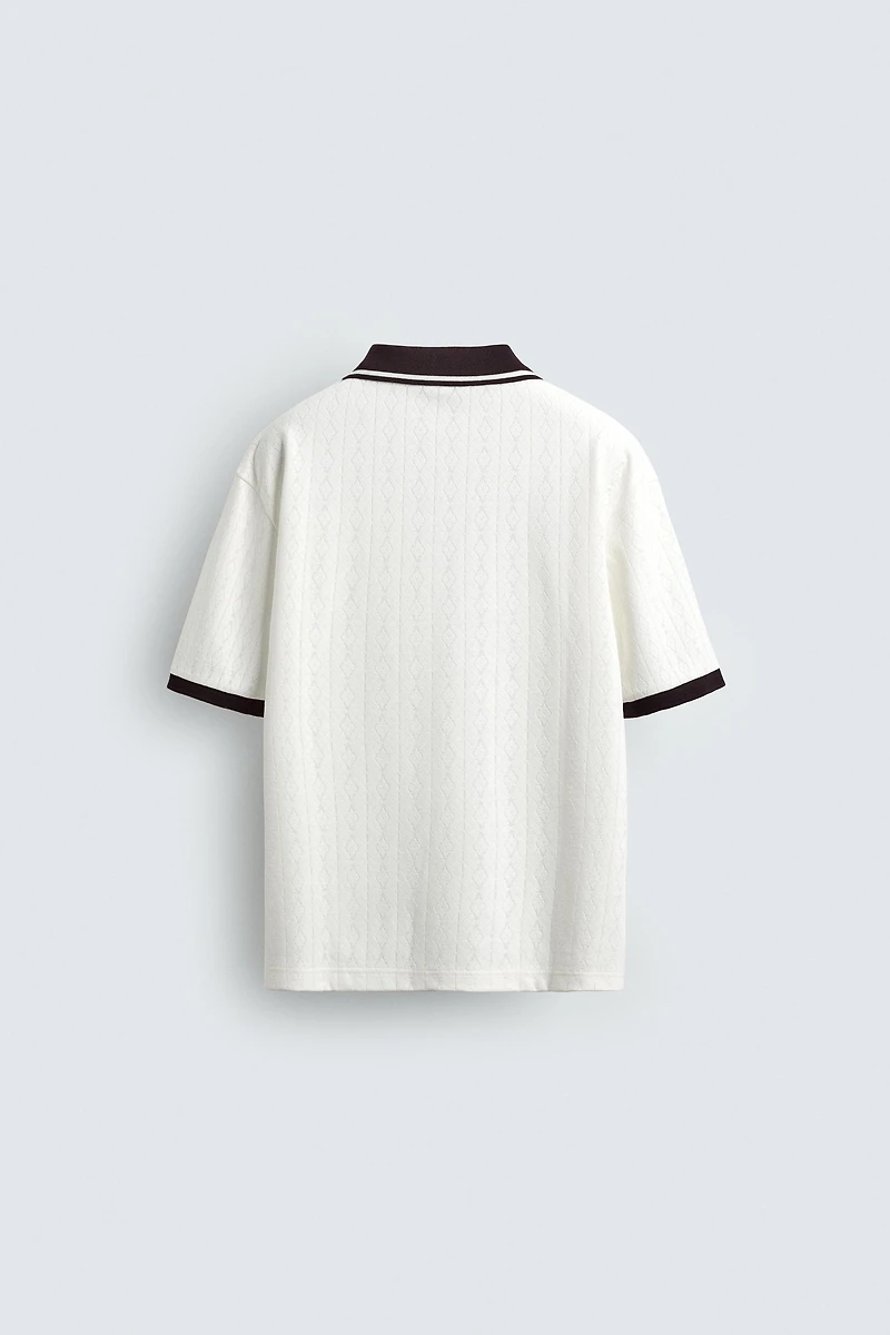 POLO JACQUARD VERTICAL BRODÉ