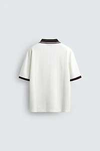 POLO JACQUARD VERTICAL BRODÉ