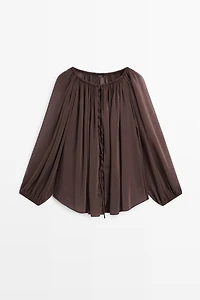 Flowing shirt with gathered details
