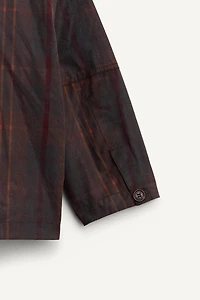 MANTEAU À CARREAUX CIRÉ ÉDITION LIMITÉE