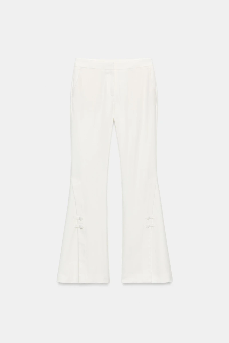 PANTALON À OUVERTURES SUR LE BAS