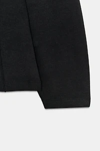 PLEATED INTERLOCK TOP