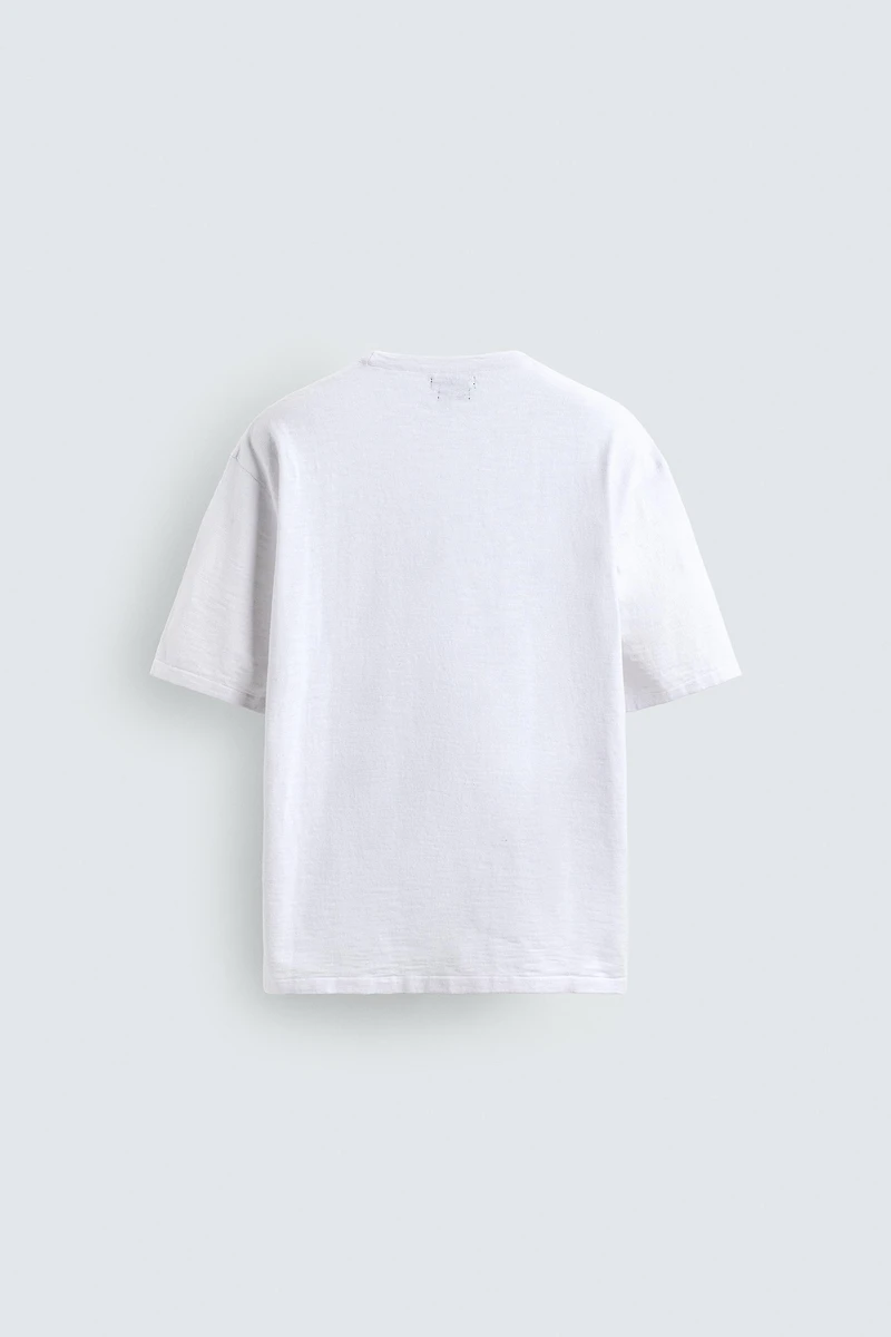 T-SHIRT EN MAILLE STRUCTURÉE FLAMMÉE