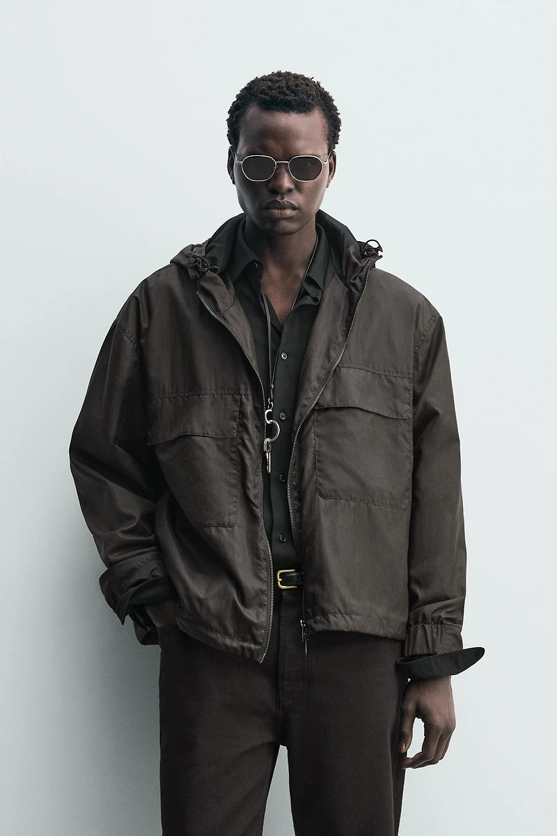 HOODED TECHNICAL JACKET
