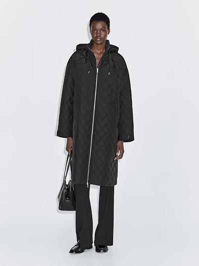 Long water-repellent oversize quilted parka