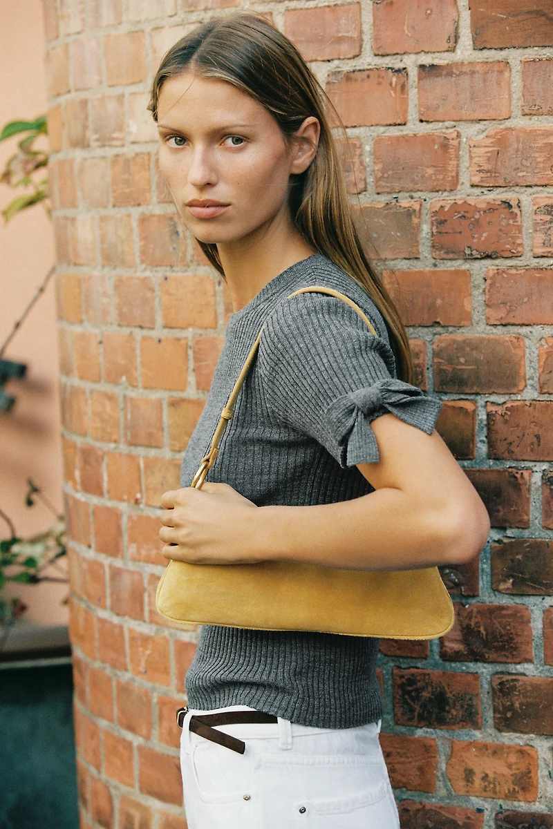 RIBBED KNIT SWEATER WITH BOWS