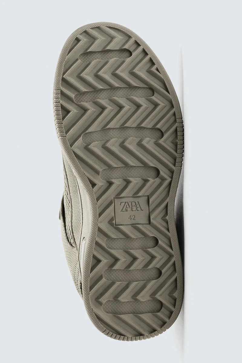 DISTRESSED THICK-SOLED SNEAKERS