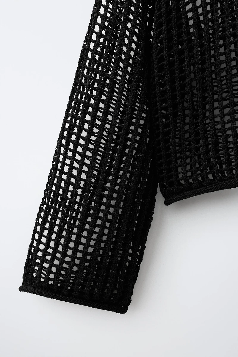 PULL EN RÉSILLE À CAPUCHE