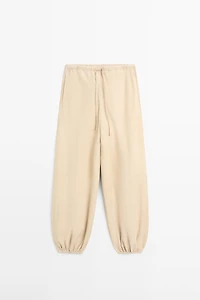 Suede leather sarouel trousers
