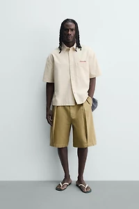 PLAID SHIRT WITH EMBROIDERED TEXT