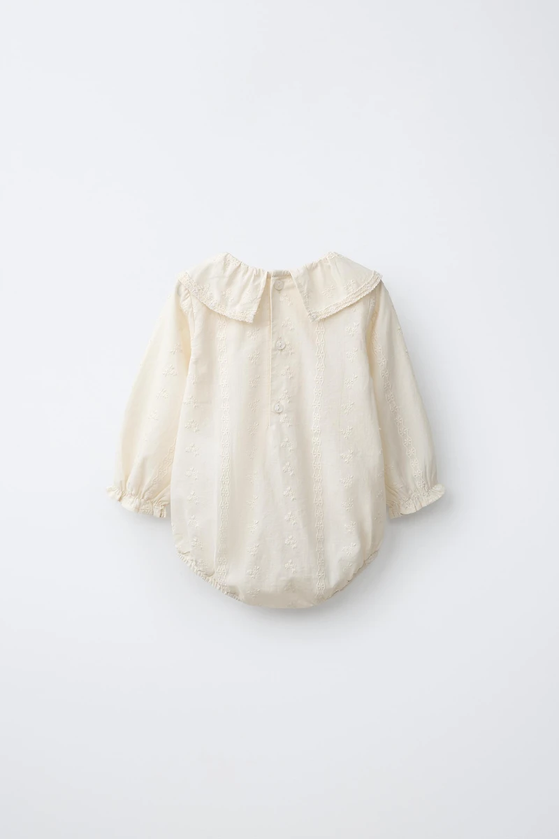 EMBROIDERED FLORAL BODYSUIT