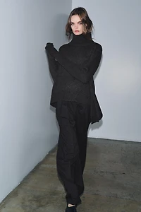 WOOL SWEATER WITH ASYMMETRIC HEM