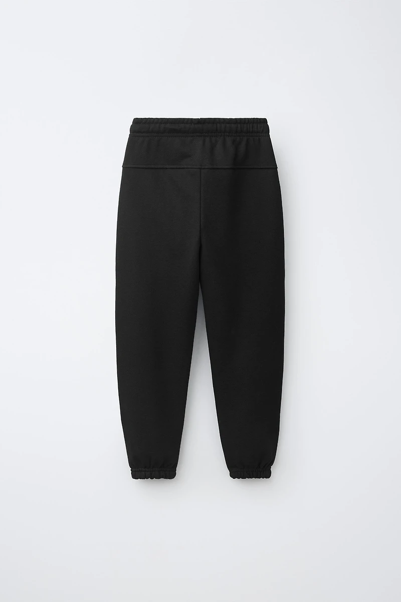 SOLID FLEECE JOGGERS WITH LABEL