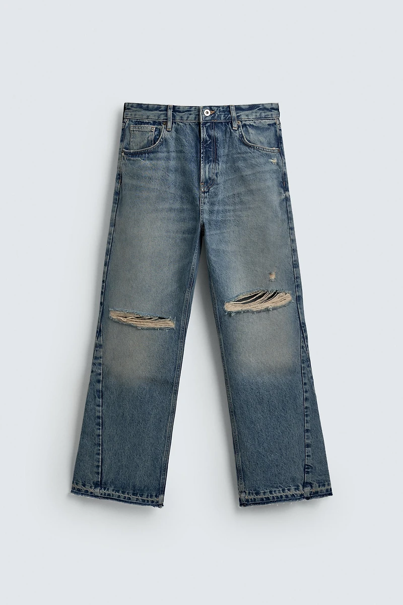 FLARE FIT RIPPED JEANS