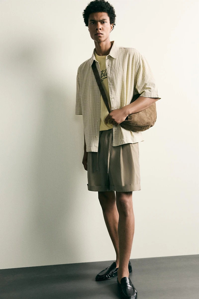 FLUID RELAXED FIT PLEATED SHORTS