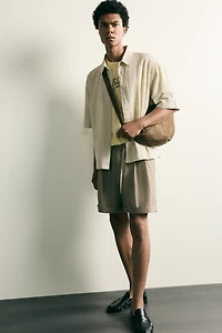 FLUID RELAXED FIT PLEATED SHORTS