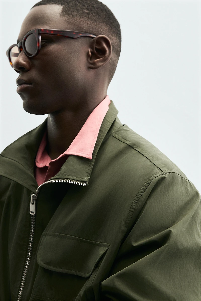 TECHNICAL PARKA WITH POCKETS