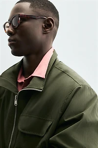 TECHNICAL PARKA WITH POCKETS
