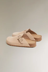 SABOTS EN CUIR BOUCLE