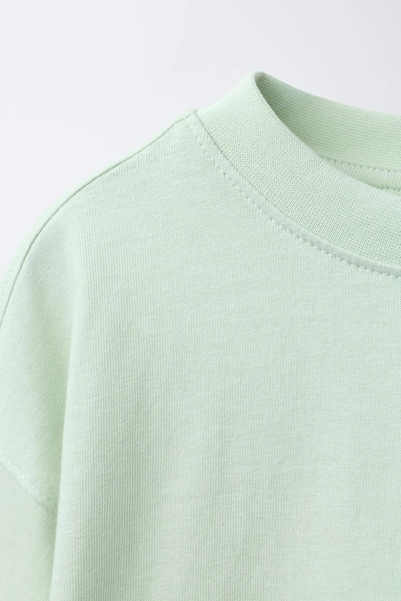 T-SHIRT WITH POCKET LABEL