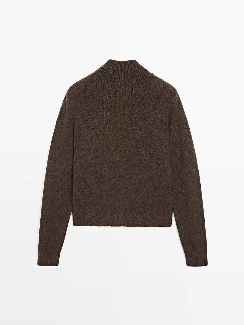 High neck knit sweater with snap buttons