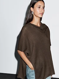 Cape en maille avec foulard