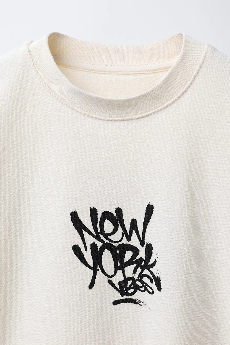 TEXTURED GRAFFITI PRINT T-SHIRT