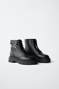LACED ANKLE BOOTS WITH CHARMS