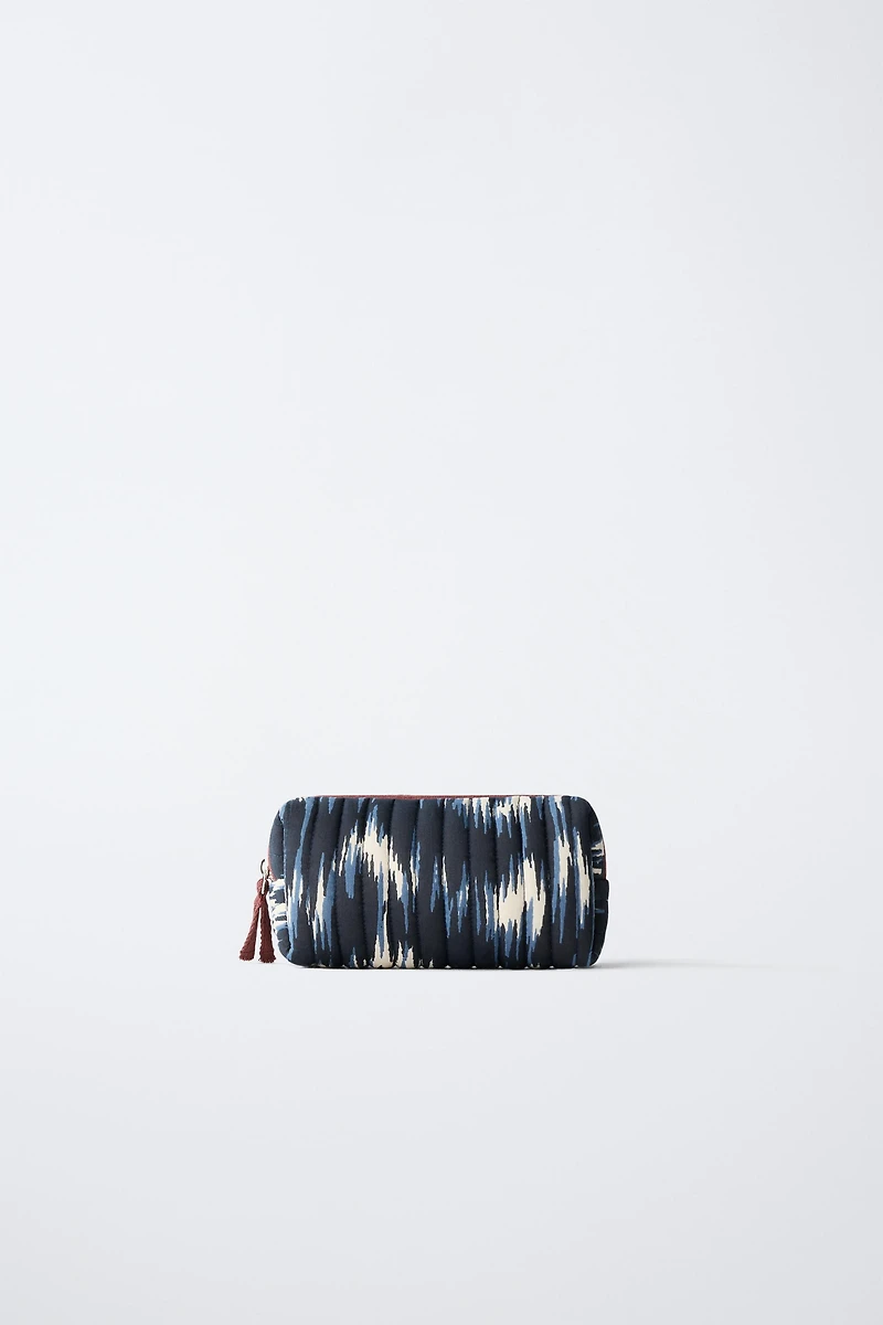 TIE-DYE TOILETRY BAG