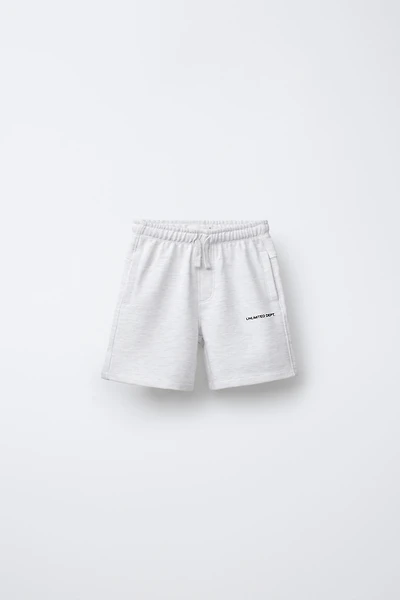 STRAIGHT FIT EMBOSSED TEXT TERRY SHORTS