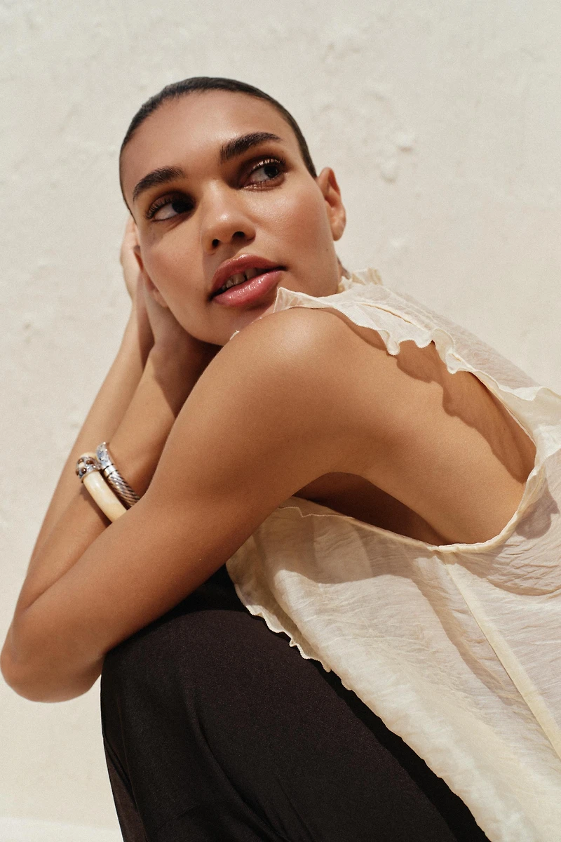 SEMI-SHEER RUFFLED TOP