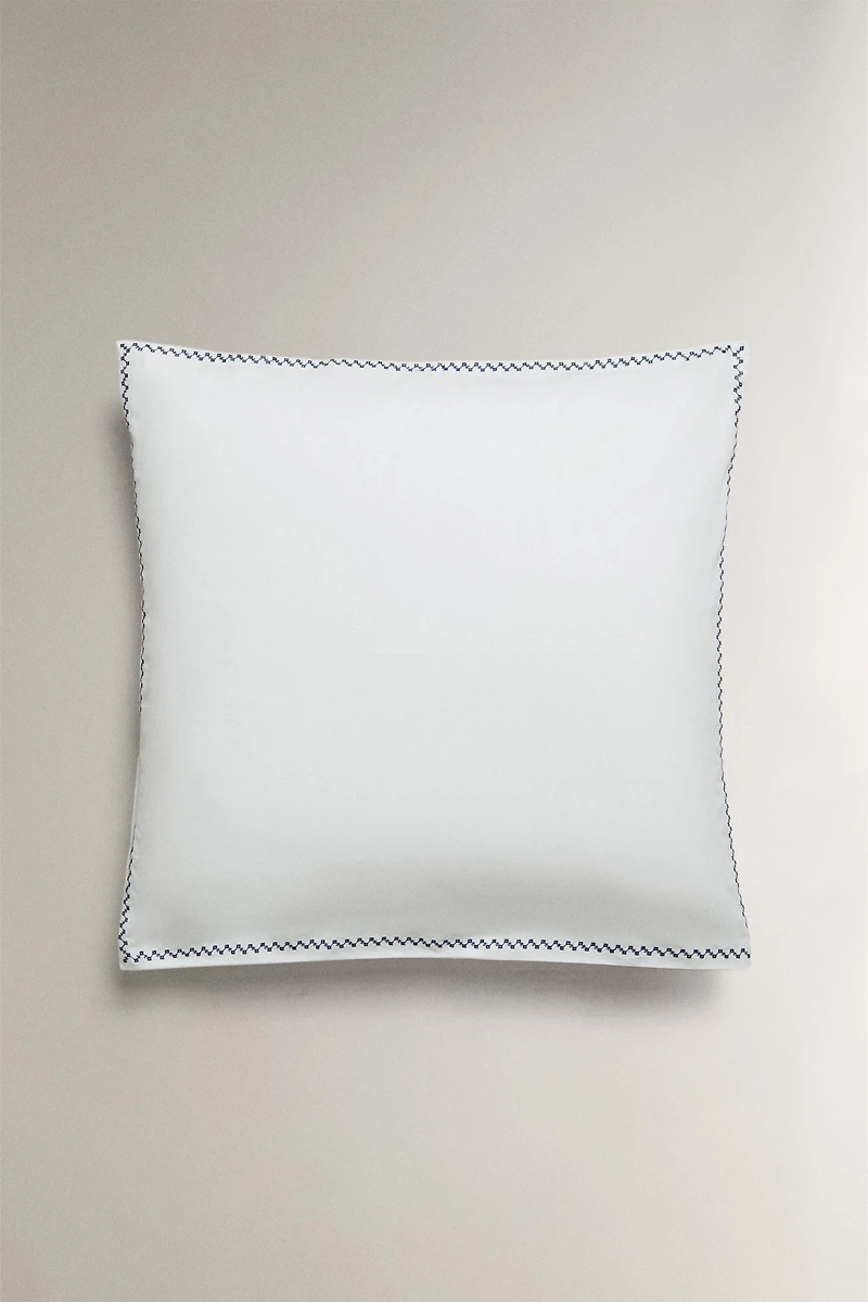 TAIE D’OREILLER BRODERIE BORDURE