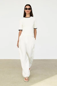 Short sleeve cable-knit sweater