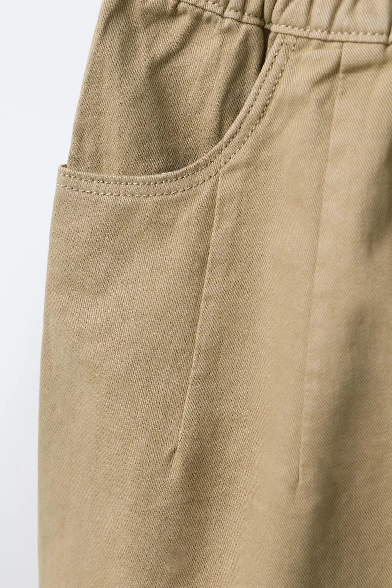 SOFT TOUCH PLEATED BAGGY PANTS