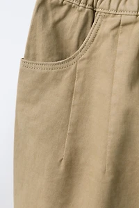 SOFT TOUCH PLEATED BAGGY PANTS