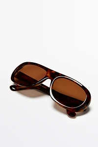 Oval tortoiseshell-effect sunglasses