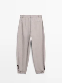 Wool blend trousers with buckle detail