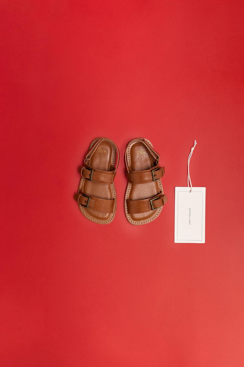 BUCKLED SANDALS
