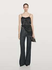 High-waist wide-leg jeans with chains