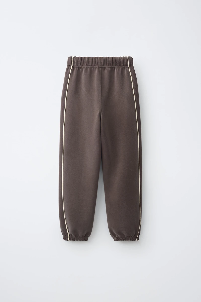 SPORTY CONTRAST PIPING TROUSERS