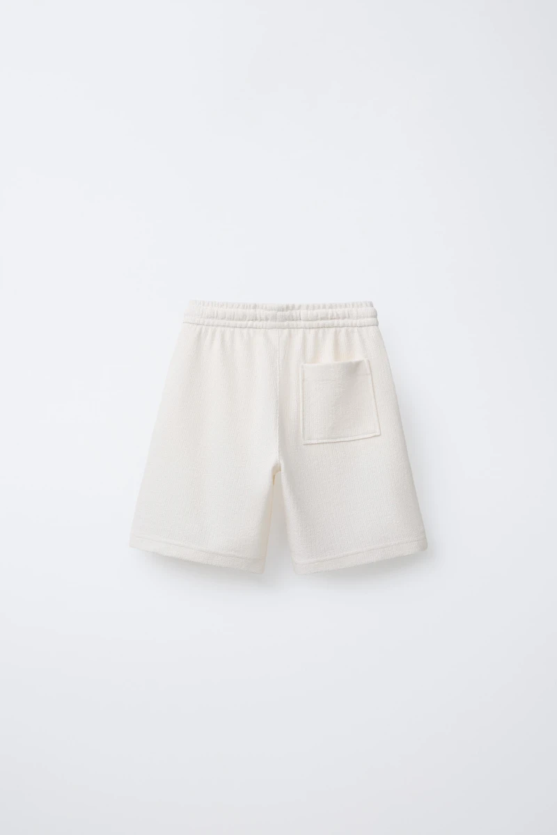 SLIM FIT TEXTURED TOWEL SHORTS