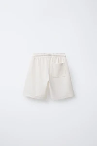SLIM FIT TEXTURED TOWEL SHORTS