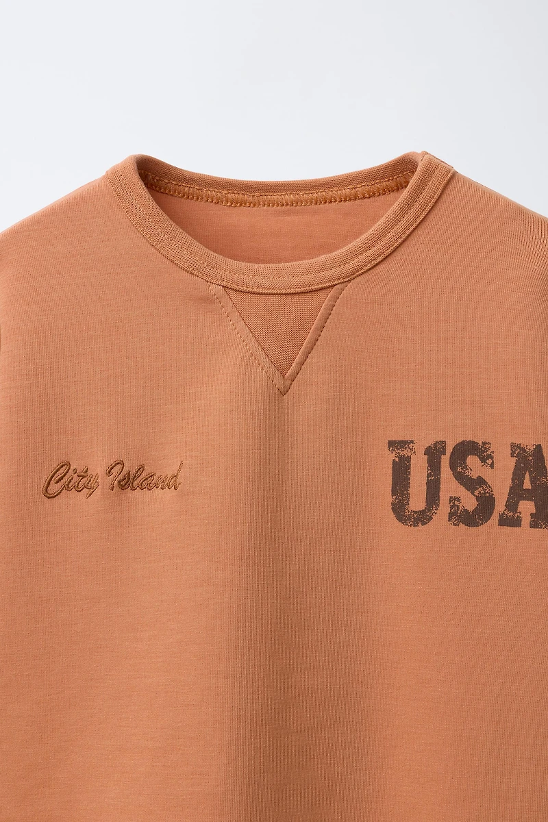 INTERLOCK TEXT T-SHIRT