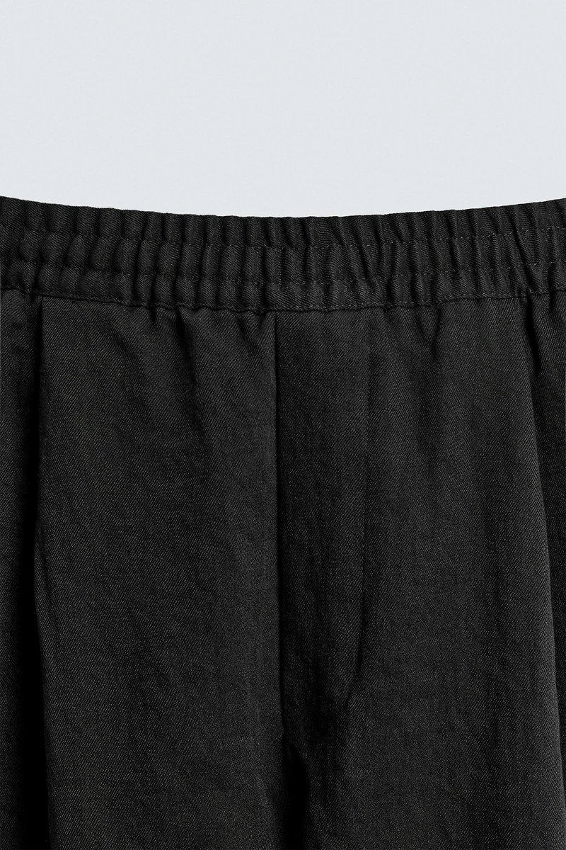 FLOWY PLEATED PANTS