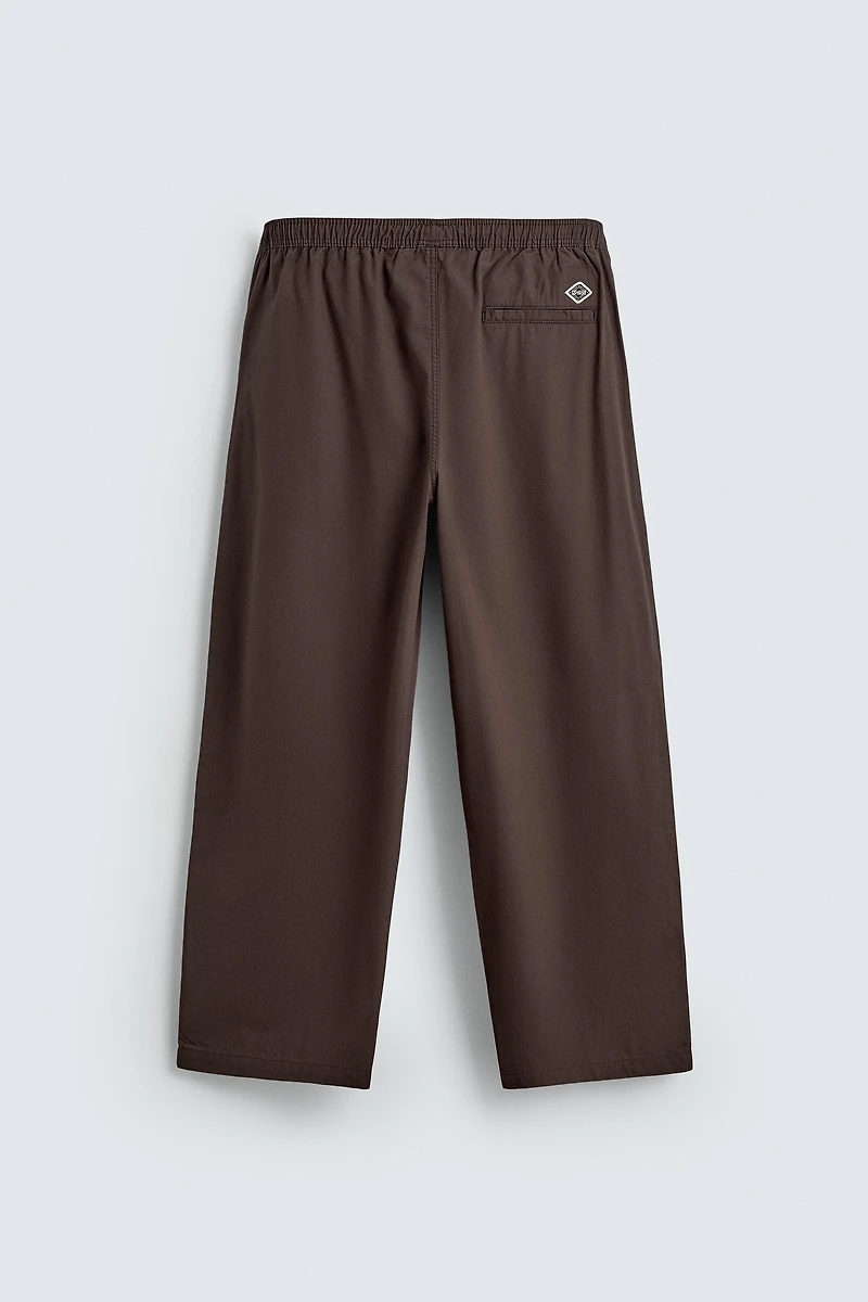 PANTALON BALLON À PLIS
