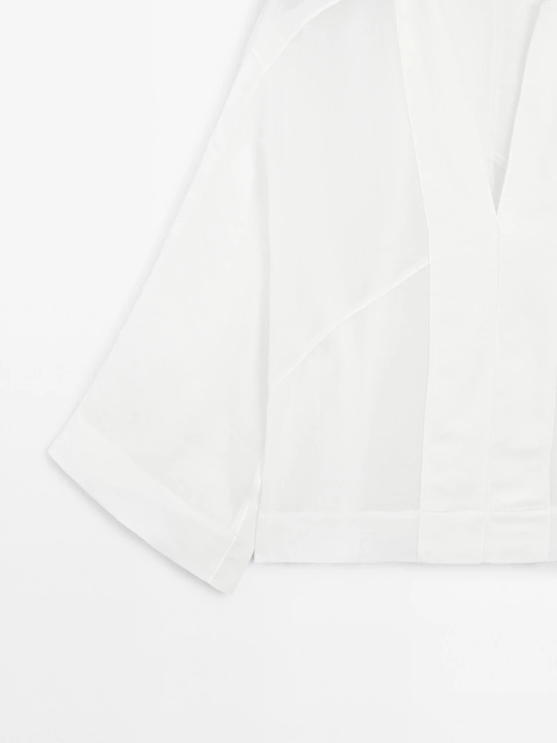 Flowing linen blend blouse with seam details