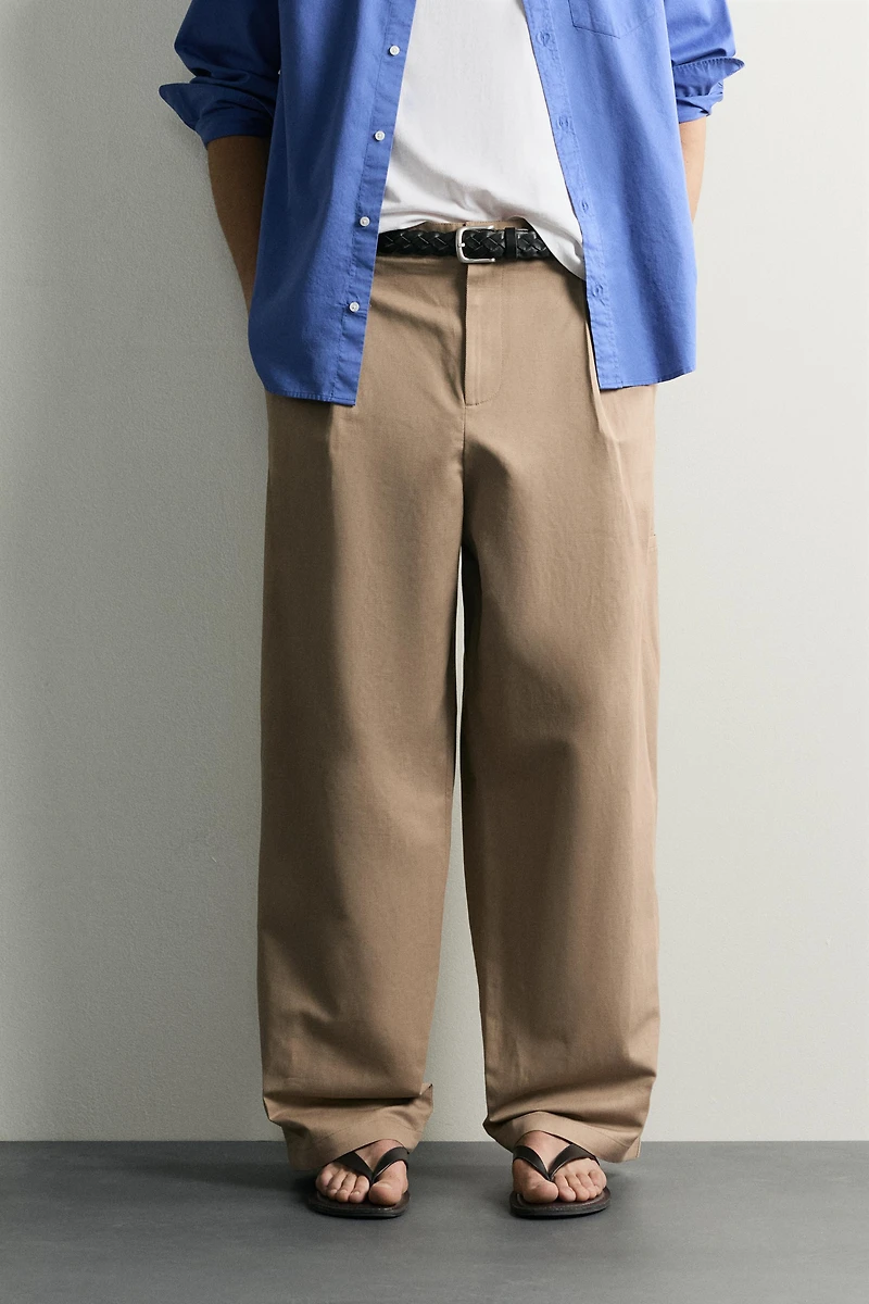 RELAXED FIT PLEATED PANTS