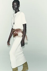 CUT-OUT KNIT MIDI SKIRT