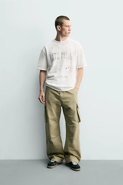 T-SHIRT EN MAILLE À IMPRIMÉS DÉLAVÉS