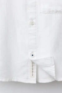CHEMISE UNIE À POCHE